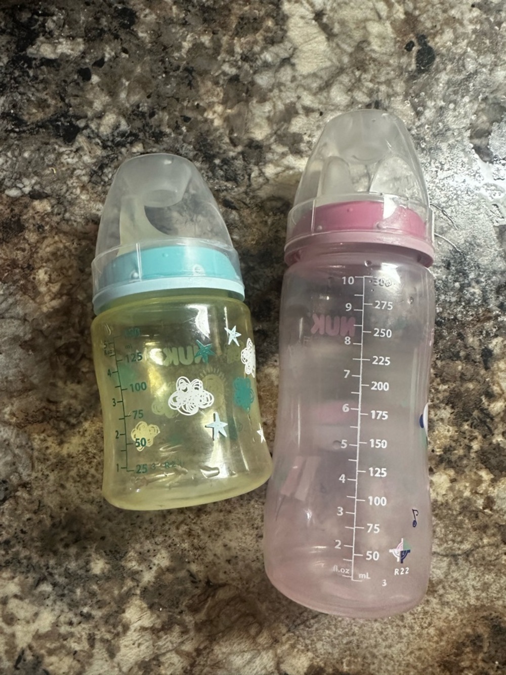 Pink & blue Baby Bottles with Measurement Markings
